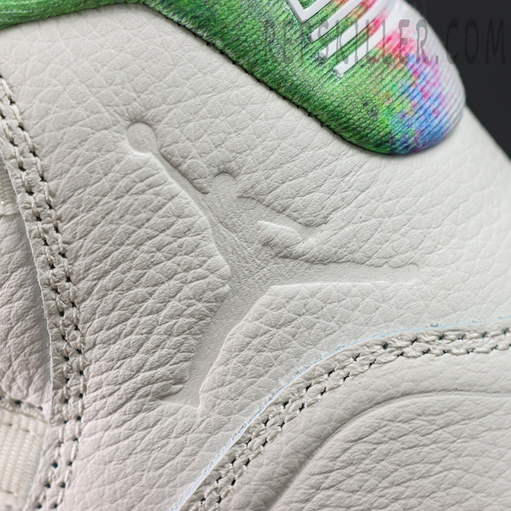 Detailed view of the embossed Jumpman logo on the white tumbled leather of the Jordan 11 Retro ‘285’.