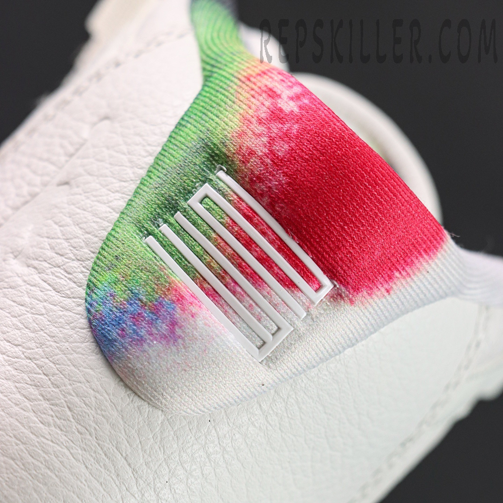 Close-up of the multicolor gradient heel tab with the “23” branding on the Jordan 11 Retro ‘285’.