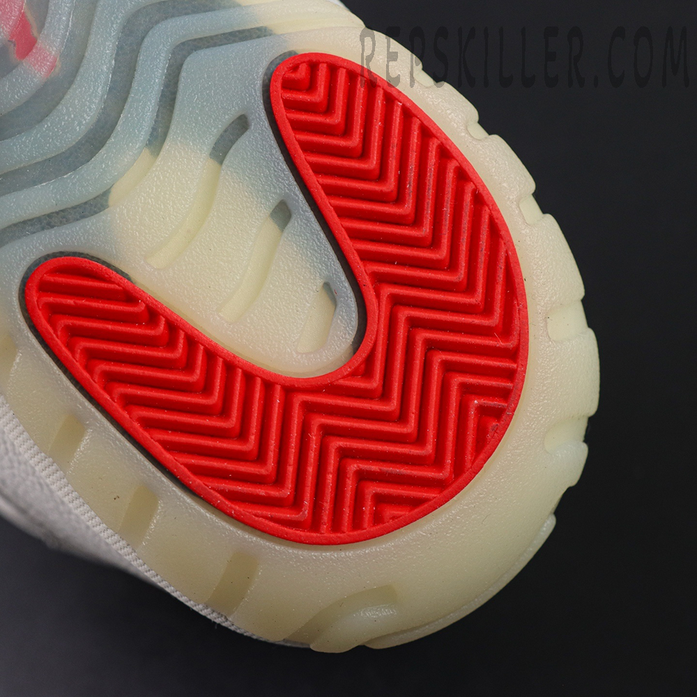 Air Jordan 11 Retro “285” outsole close-up with red traction pods