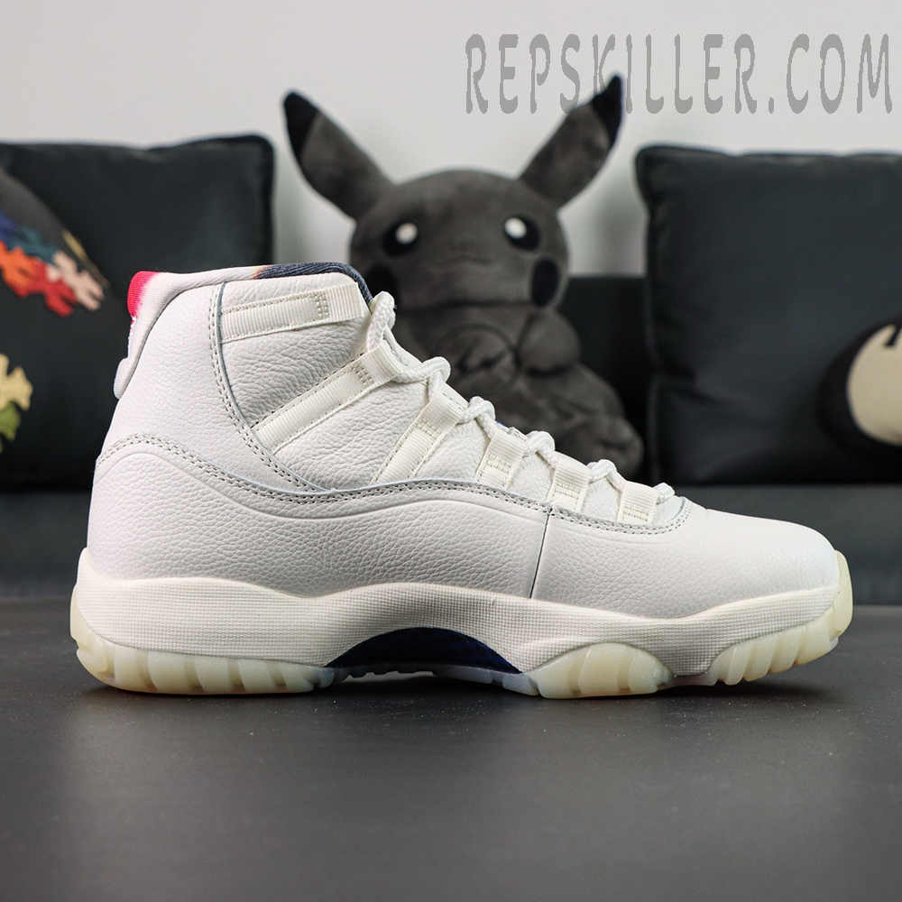 Air Jordan 11 Retro “285” side view in white leather with translucent outsole
