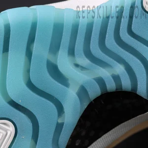 Close-up of the icy blue translucent outsole and wave traction pattern on the Jordan 11 Retro ‘H-Town’.