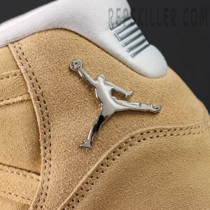 Metallic Jumpman logo detail on the heel of the Jordan 11 Retro ‘H-Town’ suede upper.
