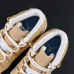 Top-down view of the Jordan 11 Retro ‘H-Town’ showing padded white collar and blue insole with Jumpman logo.