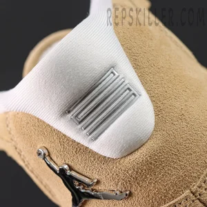 Close-up of the white heel tab with metallic stripe detail on the Jordan 11 Retro ‘H-Town’.