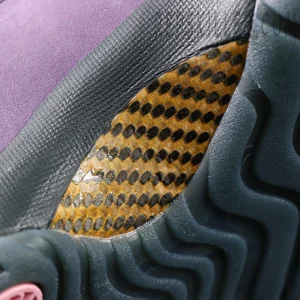 Close-up of Air Jordan 11 ‘Mojave’ carbon fiber shank plate on outsole