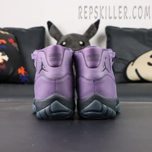 Air Jordan 11 Retro ‘Mojave’ rear heel view showing purple nubuck upper and black Jumpman logo