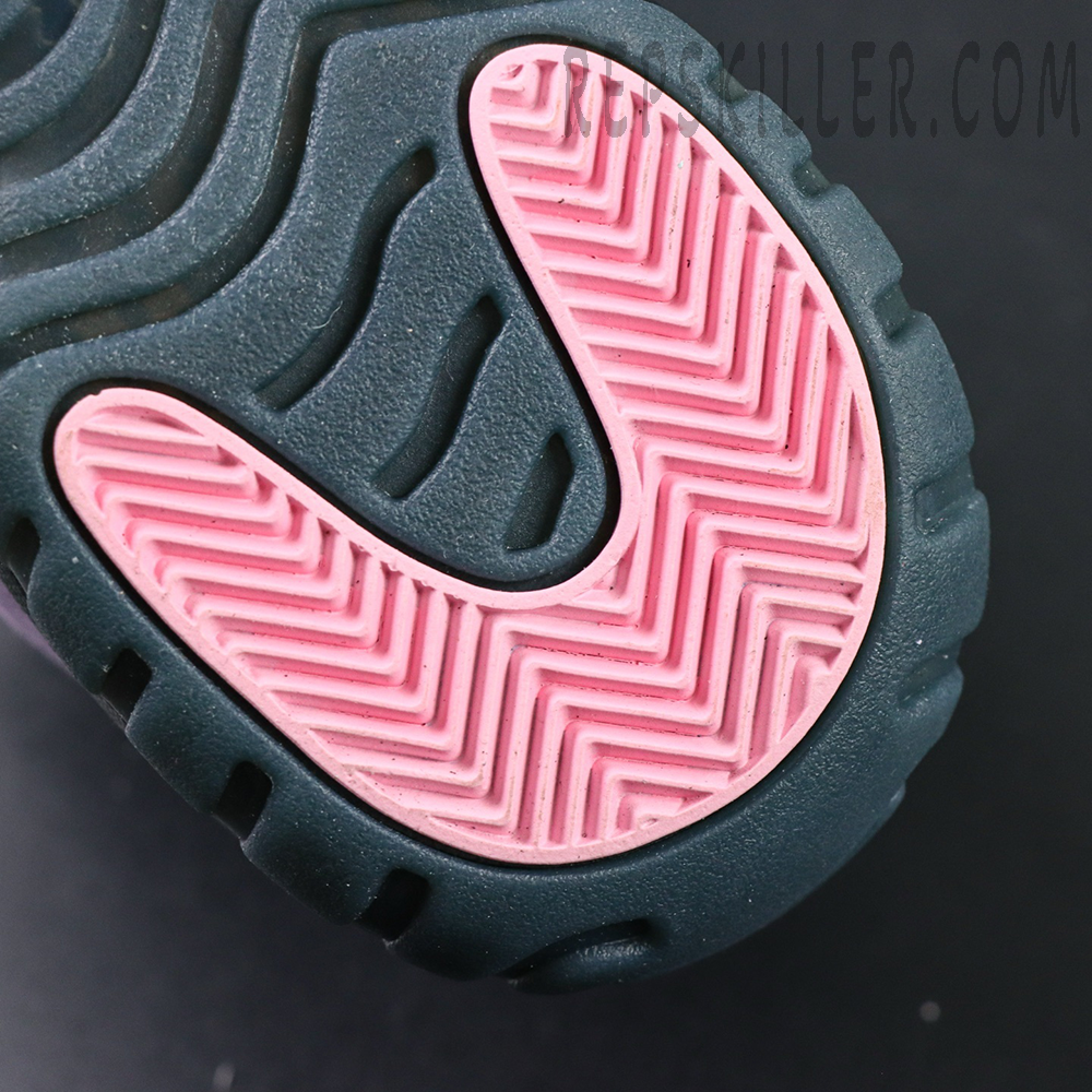 Close-up of pink traction pod on outsole of Air Jordan 11 ‘Mojave’
