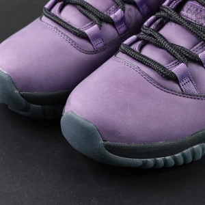 Toe box close-up showing the smooth purple suede material on the Jordan 11 Retro ‘Mojave’.