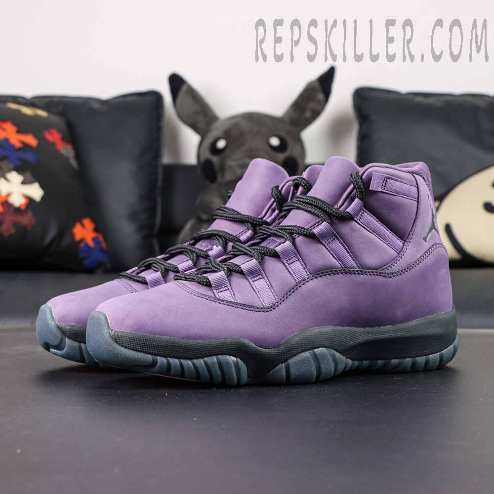 Front angled view of the Jordan 11 Retro ‘Mojave’ highlighting the purple upper and dark outsole.