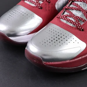 Detailed view of metallic silver toebox and perforations on Kobe 5 Protro ‘Lower Merion Aces’.