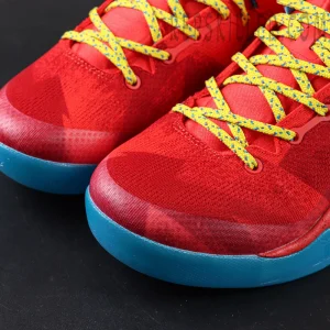 Close-up of Kobe 8 Protro Year of the Horse toe box and knit material with yellow speckled laces.