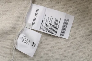 MM Logo-Embroidered Stand Collar Zip-Up Jacket Wash label