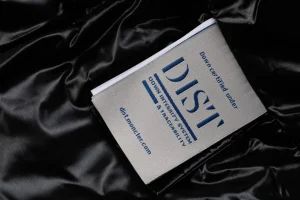 Mxxcler Genius 1952 Logo Hooded Long Down Jacket Wash label