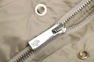 Mxxcler × 1017 ALYX 9SM Hooded Down Jacket Brown Zipper puller