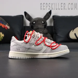 Lateral profile of Off-White x Nike Dunk Low Lot 33 of 50 featuring Off-White industrial text printed on suede.