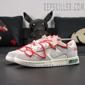 Off-White x Nike Dunk Low Lot 33 of 50 positioned with original Off-White box featuring cut-out circular design.