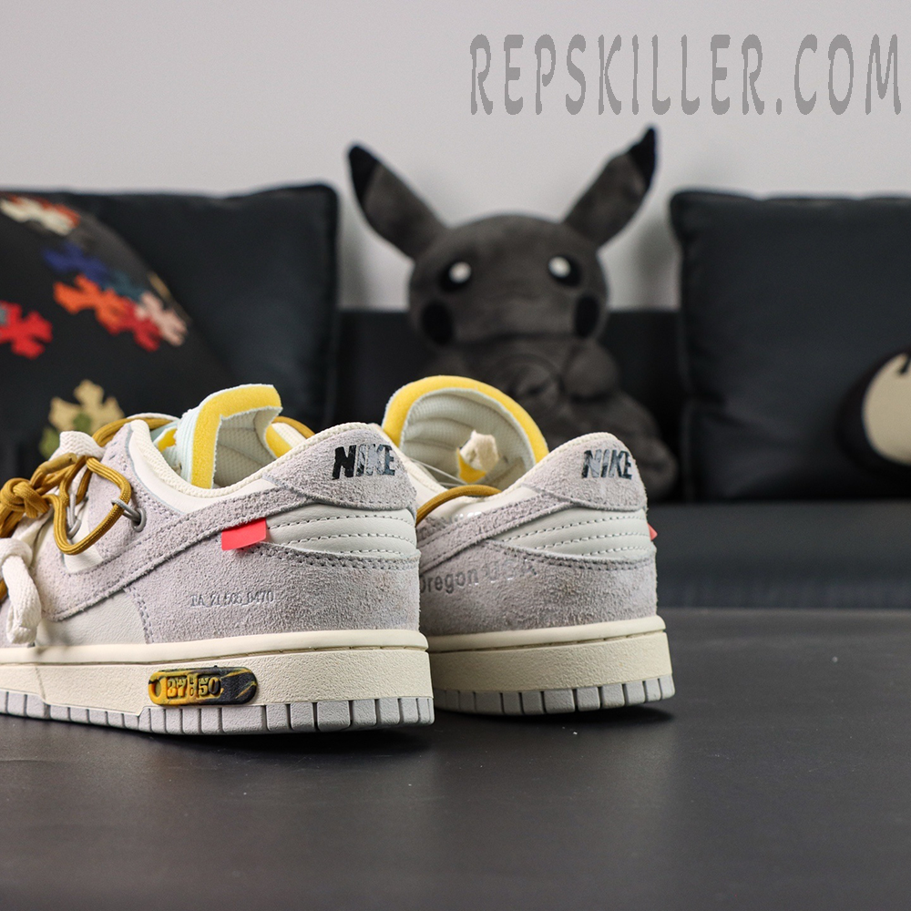 Off-White x Nike Dunk Low Lot 37 of 50 heel view showing NIKE branding and suede upper