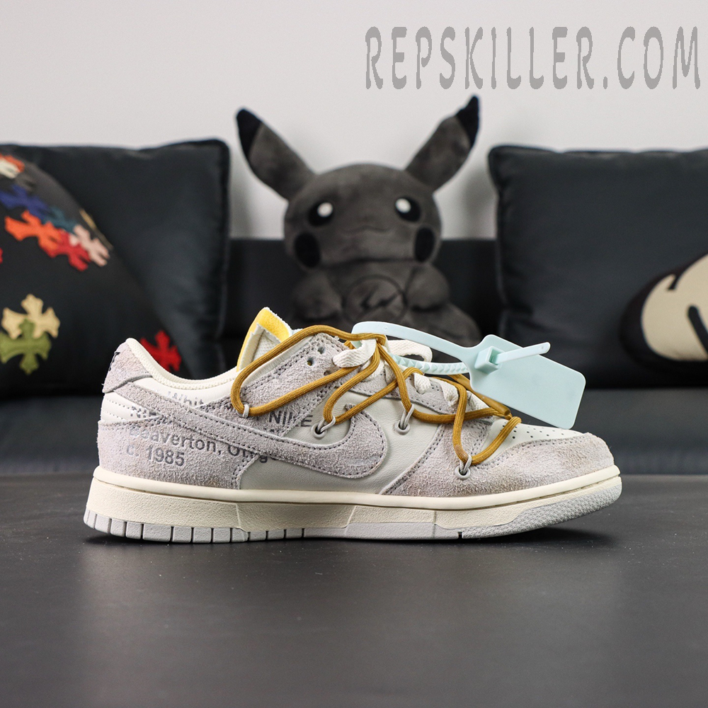 Off-White x Nike Dunk Low Lot 37 of 50 lateral side view displaying suede overlays and text print