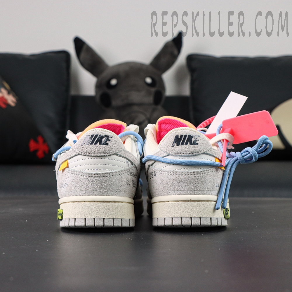 Back view of Off-White x Nike Dunk Low Lot 38 of 50 showing Nike heel branding and zip tie