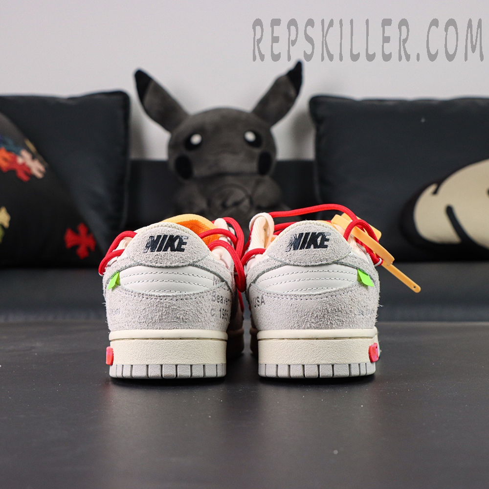 Rear heel view of Off-White x Nike Dunk Low Lot 40 of 50 showing Nike embroidery and suede heel panels