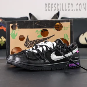 Off-White x Nike Dunk Low Lot 50 of 50 sneakers with black leather upper, metallic silver Swoosh and purple lot badge displayed in front of shoebox.