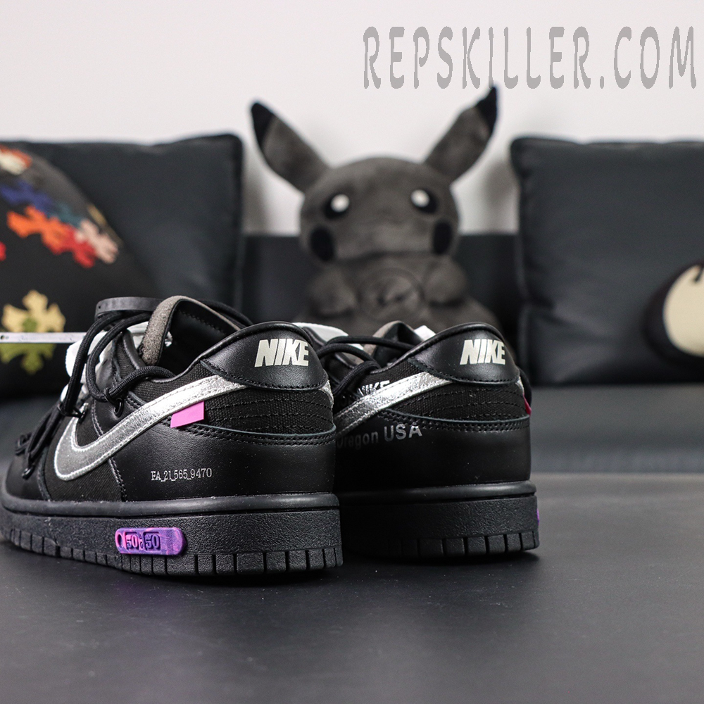 Rear angle of Off-White x Nike Dunk Low Lot 50 of 50 highlighting Nike heel branding and purple lot tab.