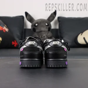 Back view of Off-White x Nike Dunk Low Lot 50 of 50 showing dual heel branding and suede detailing.