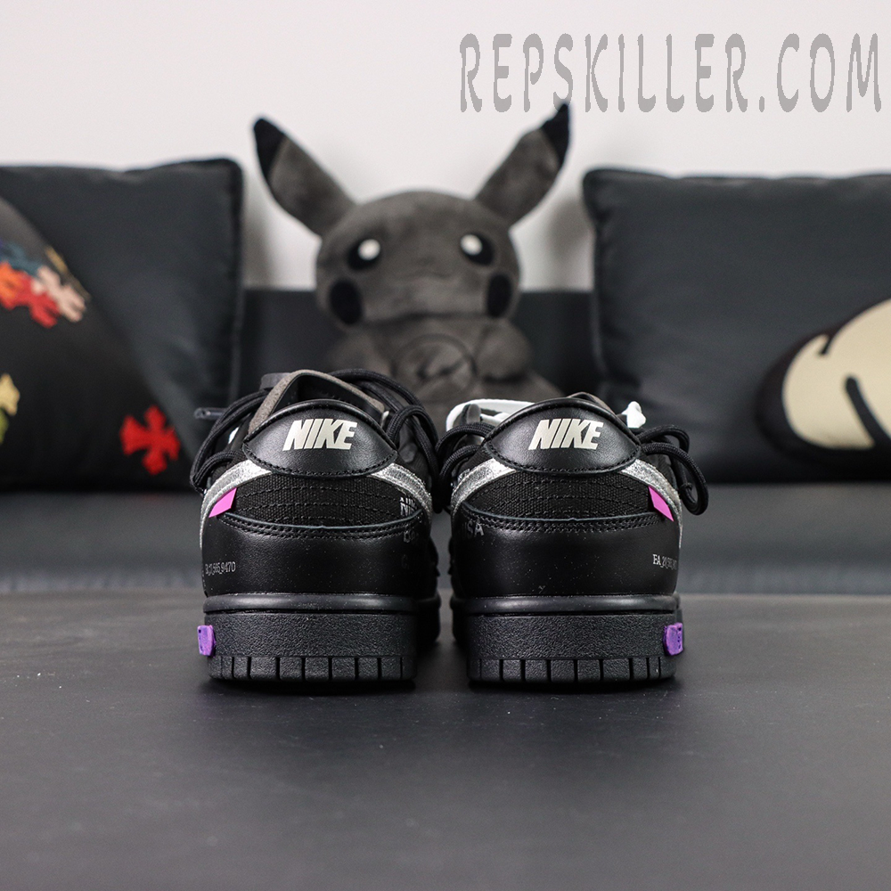 Back view of Off-White x Nike Dunk Low Lot 50 of 50 showing dual heel branding and suede detailing.