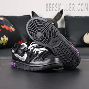 Bottom view of Off-White x Nike Dunk Low Lot 50 of 50 featuring black outsole and purple lot badge.