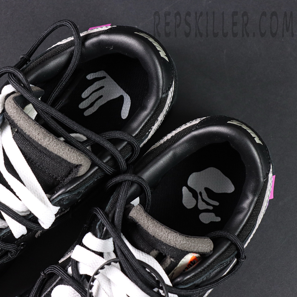 Insole view of Off-White x Nike Dunk Low Lot 50 of 50 showing signature Off-White hand graphic.