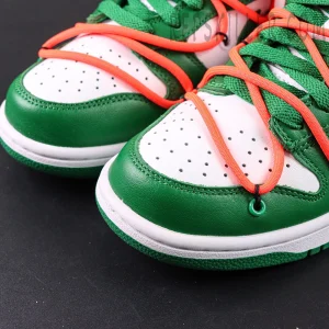 Off-White x Nike Dunk Low ‘Pine Green’ toe box close-up showing leather and orange overlay lace