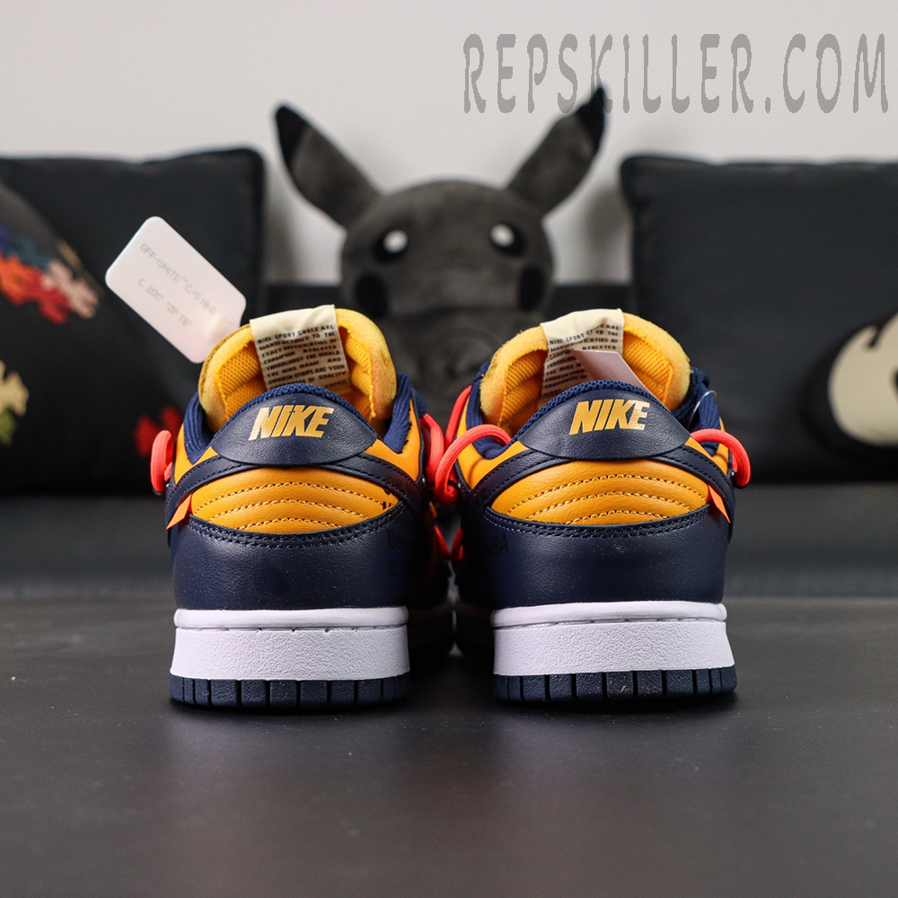 Rear view of Off-White x Nike Dunk Low University Gold showing yellow Nike heel branding