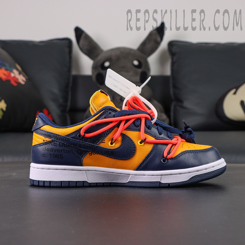 Lateral side profile of Off-White x Nike Dunk Low University Gold with signature orange secondary laces