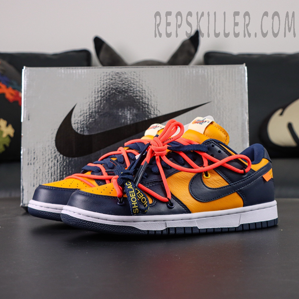 Off-White x Nike Dunk Low University Gold sneakers with silver Nike box in the background