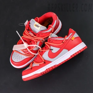 Top-down view of the Off-White Dunk Low “University Red” showcasing the exposed foam tongue, Nike tongue tag, and dual-lace system design.