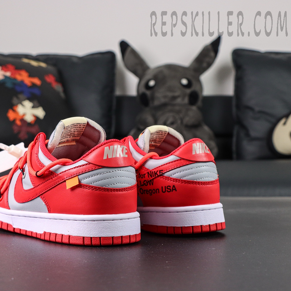 Full pair display of the Off-White x Nike Dunk Low “University Red” with original box in background, highlighting the iconic collaboration design.