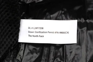 TNF UE Lightweight Hooded Down Jacket Wash label