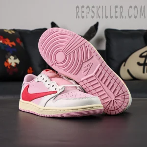 Outsole view of the Travis Scott x Air Jordan 1 Low OG “Tropical Pink” featuring a pink rubber sole with Nike branding.
