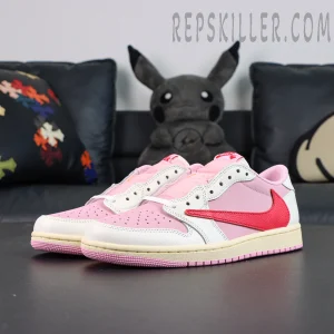 Travis Scott x Jordan 1 Low OG “Tropical Pink” sneakers, front side angle showing pink and white upper with reversed Swoosh