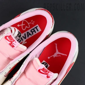 Travis Scott x Jordan 1 Low OG “Tropical Pink” sneakers, tongue and inner lining close-up with Nike Air tag and collaboration insole