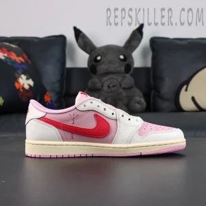 Travis Scott x Jordan 1 Low OG “Tropical Pink” sneakers, medial side view showing standard Swoosh and midsole structure