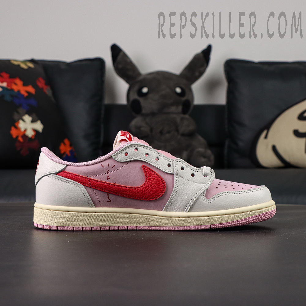 Side view of the Travis Scott x Air Jordan 1 Low OG “Tropical Pink” with the signature reversed red Swoosh and pink nubuck upper.