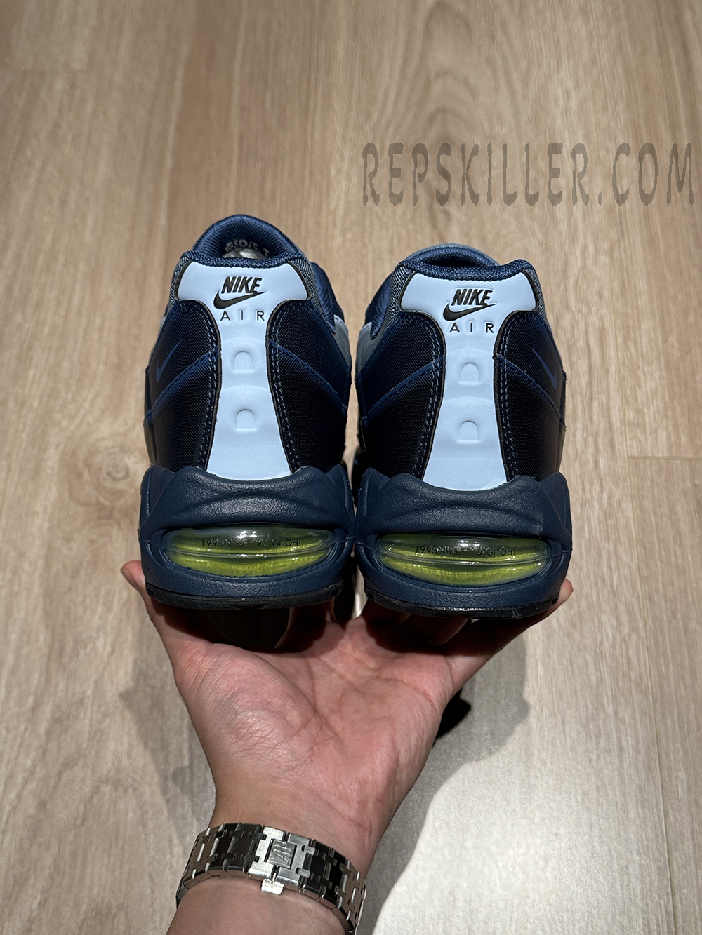 Rear heel view of the Yu-Gi-Oh! x Air Max Muscle 95 QS “Joey” with 1995 NIKE × YU-GI-OH! text inside the Air unit.