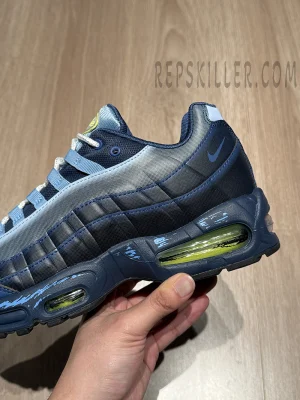 Detailed side view of the Air Max Muscle 95 “Joey” with blue-grey gradient panels and neon Air cushioning.