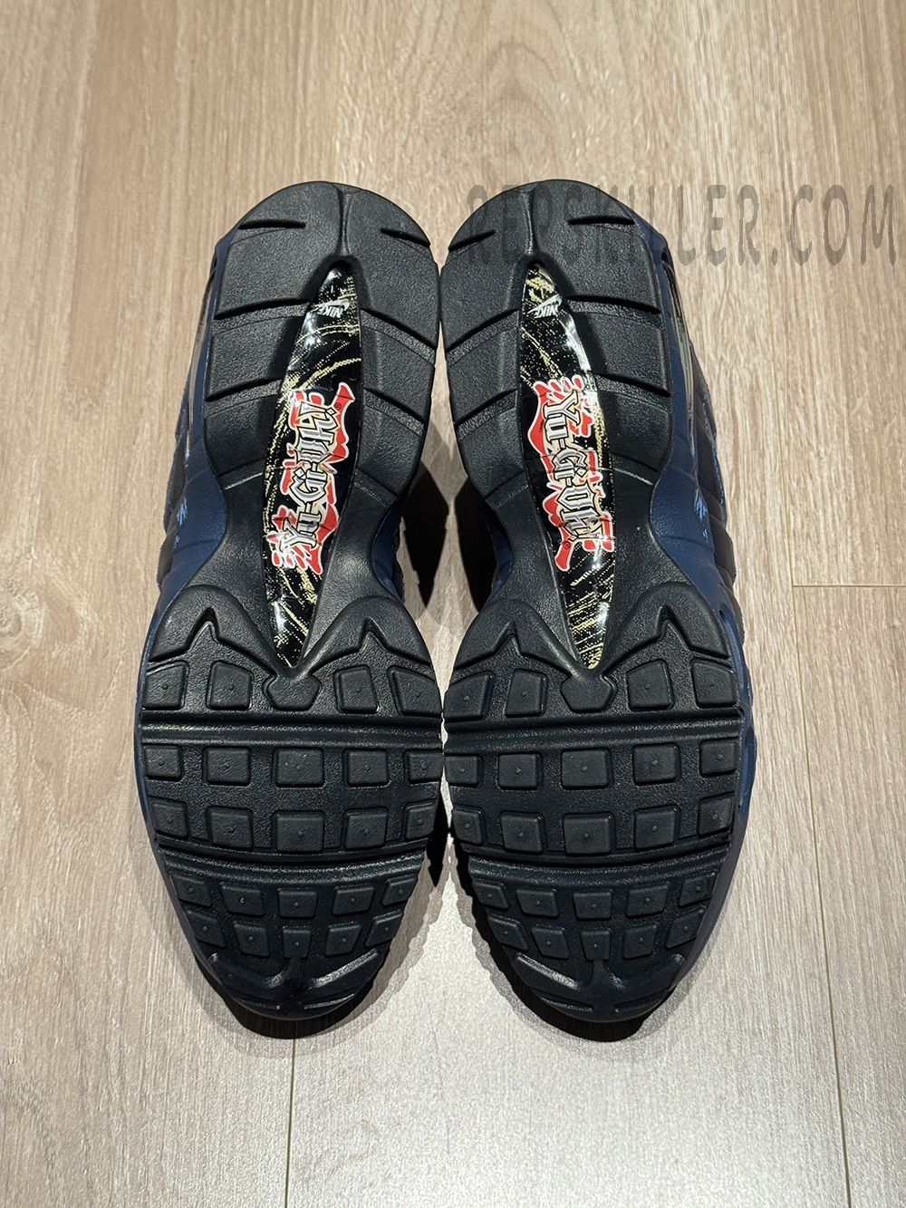 Outsole view showing Yu-Gi-Oh! logo integrated into the midfoot shank area.