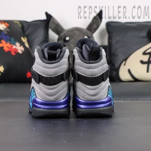 Air Jordan 8 Retro Aqua heel view featuring layered suede panels and purple midsole