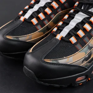 Close-up of Nike Air Max 95 OG Orange Camo upper and laces