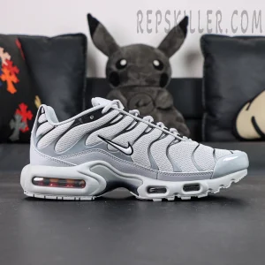 Side view of Nike Air Max Plus TN Wolf Grey featuring signature TPU overlays and iconic Nike Swoosh