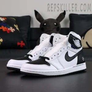 Fragment Design x Union LA x Air Jordan 1 “White Black” collaboration sneakers, side profile showing black and white color blocking and deconstructed stitching