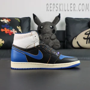 Fragment Design x Union LA x Air Jordan 1 “Sport Royal” collaboration sneakers, lateral side view with royal blue Swoosh and exposed stitching